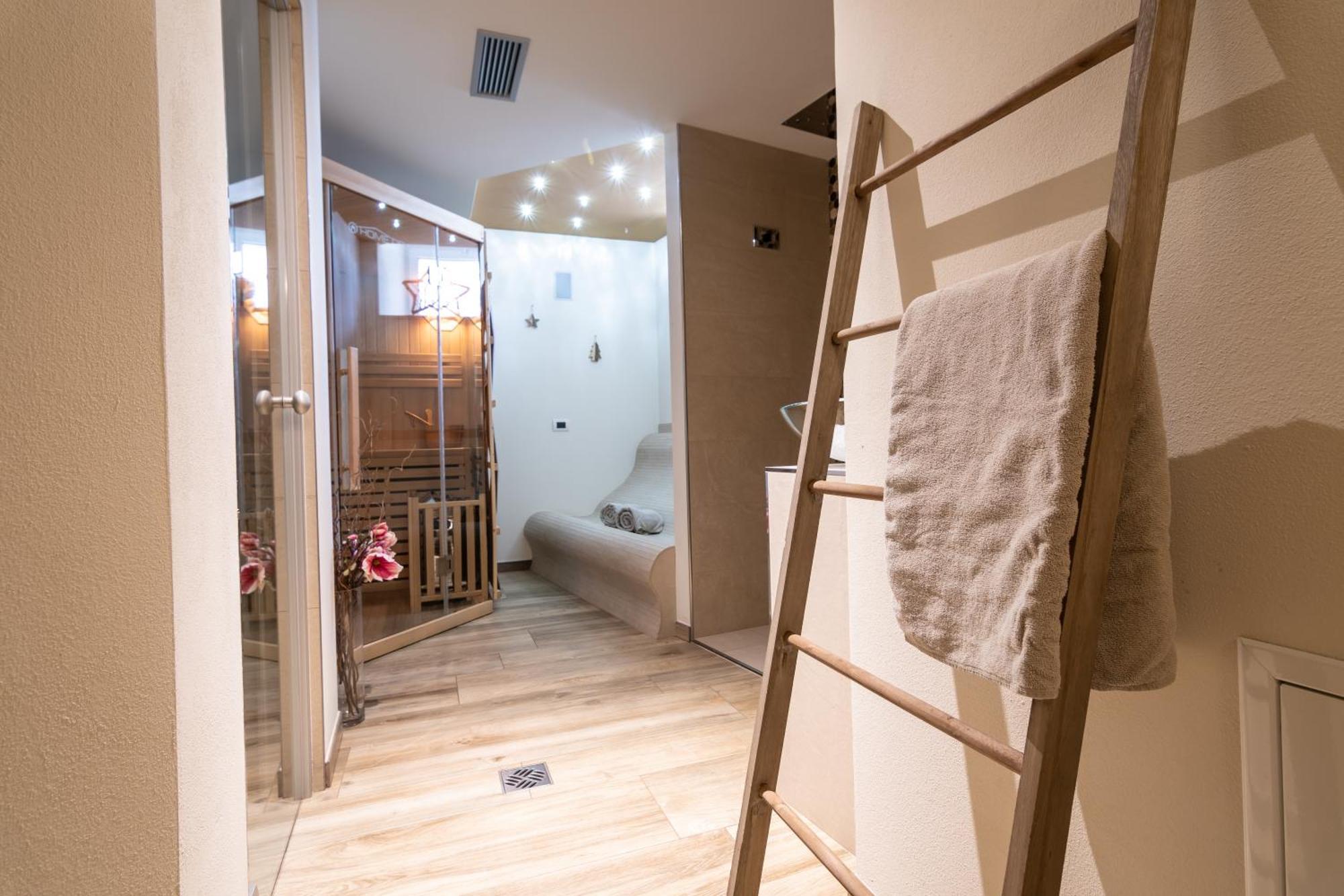 Aparthotel Dolomites Living&Relax Commezzadura Bagian luar foto